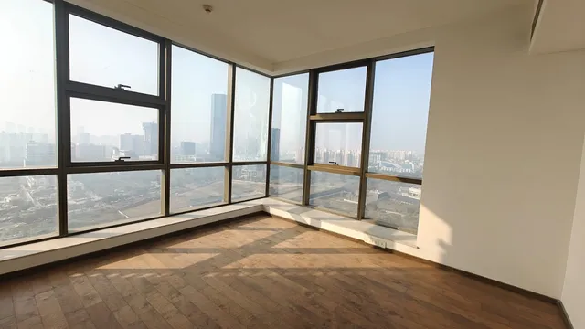 Corner 4 BHK apartment with floor-to-ceiling glass windows at M3M Golfestate Sector 65- The Soni Lanbase